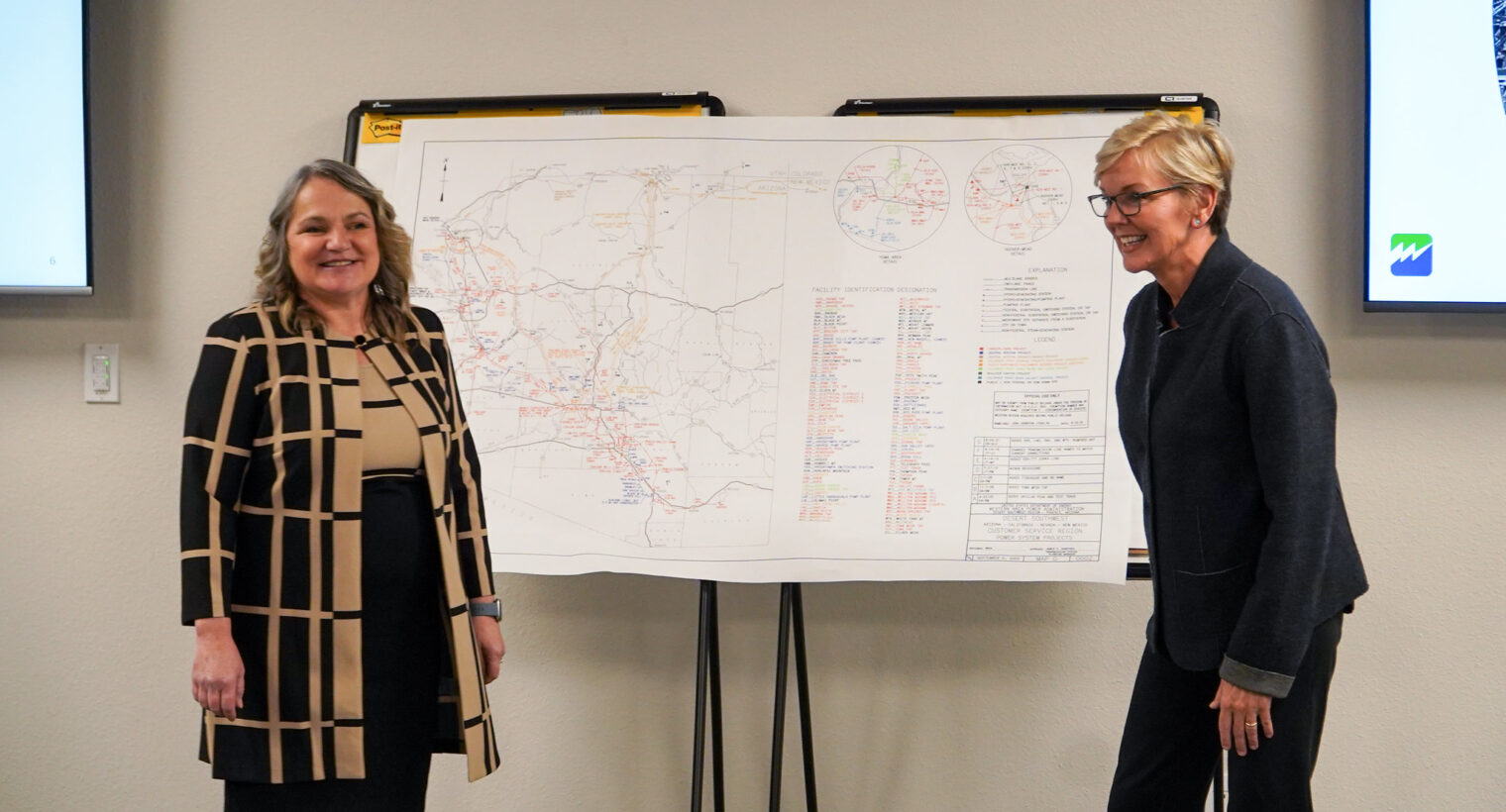 Tonya Spencer (left) briefs Secretary of Energy Jennifer Granholm Jan. 20, 2023 on the DSW service territory.