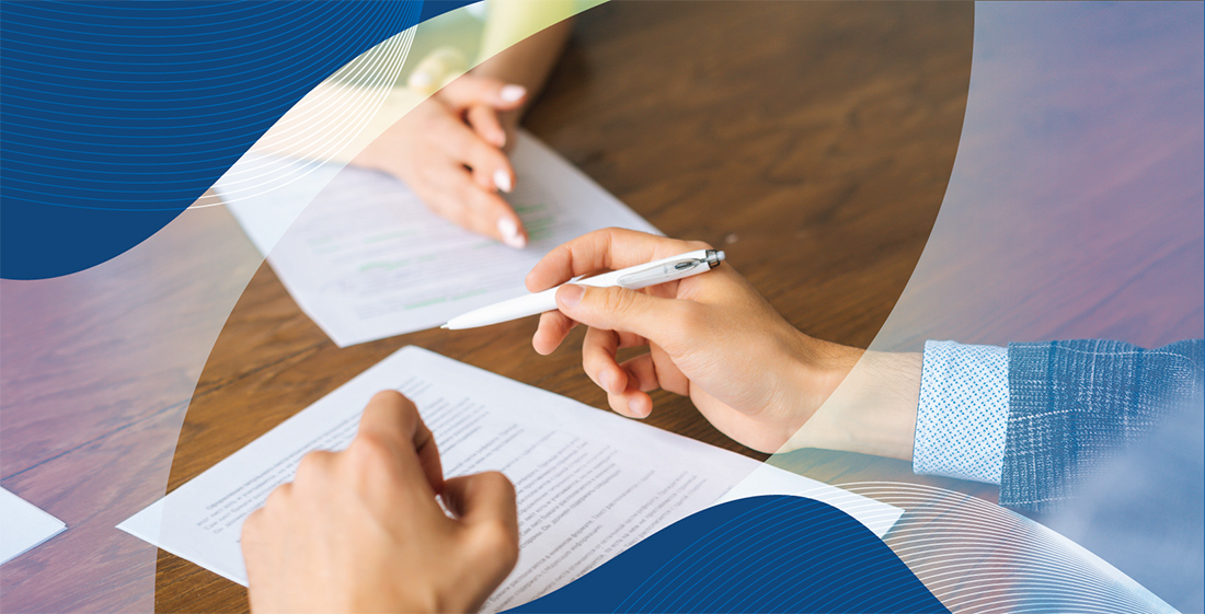 Photo of person signing contract