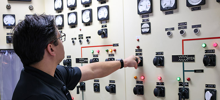 Power systems operator in the control room.