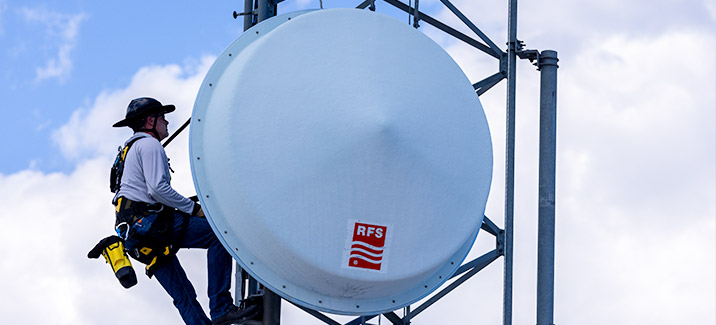 Electronic communication craftsman on a microwave communications tower.